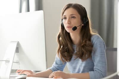 Business woman talking on telephone