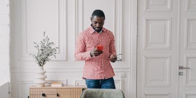 A businessman looking at his phone